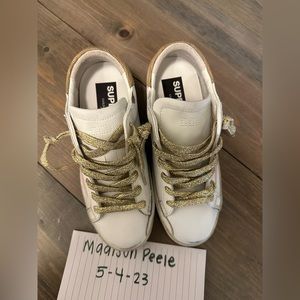 Size 35 light pink and brown superstars